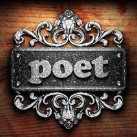 poet word of iron on wooden background photo