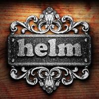 helm word of iron on wooden background photo