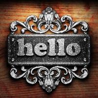 hello word of iron on wooden background photo