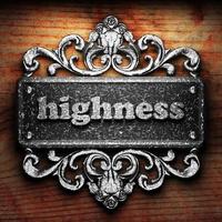 highness word of iron on wooden background photo