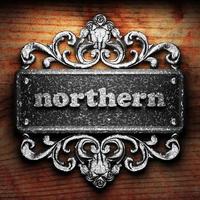 northern word of iron on wooden background photo