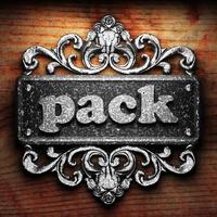pack word of iron on wooden background photo