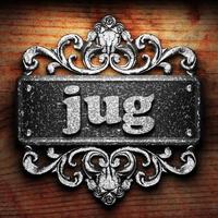 jug word of iron on wooden background photo