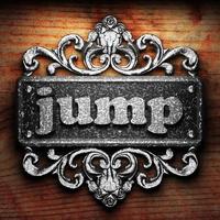 jump word of iron on wooden background photo