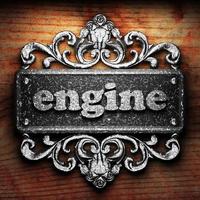 engine word of iron on wooden background photo