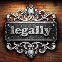 legally word of iron on wooden background photo