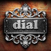 dial word of iron on wooden background photo