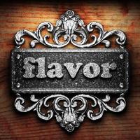 flavor word of iron on wooden background photo