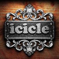 icicle word of iron on wooden background photo