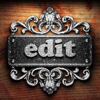 edit word of iron on wooden background photo