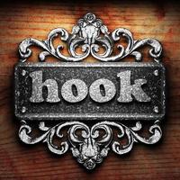 hook word of iron on wooden background photo