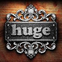 huge word of iron on wooden background photo