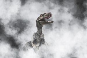 dinosaurio, velociraptor sobre fondo de humo foto