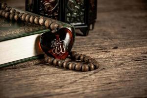 Koran  holy book of Muslims public item of all muslims  on the table , still life . photo