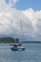 Sorong, West Papua, Indonesia, September 30th 2021. Blue fancy yacht mooring at the sea. photo