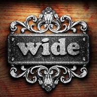 wide word of iron on wooden background photo