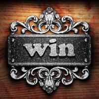 win word of iron on wooden background photo