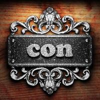 con word of iron on wooden background photo