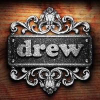 drew word of iron on wooden background photo