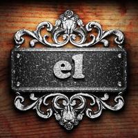 el word of iron on wooden background photo