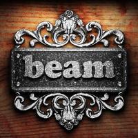 beam word of iron on wooden background photo