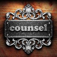 counsel word of iron on wooden background photo