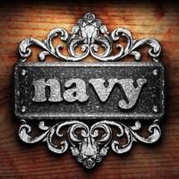 navy word of iron on wooden background photo
