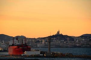 sunrise in the harbor of Marseille photo