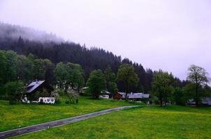 mountain landscape and buildings photo