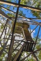 Wooden viewpoint tower tropical jungle to Muyil Lagoon panorama Mexico. photo