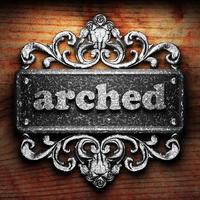 arched word of iron on wooden background photo