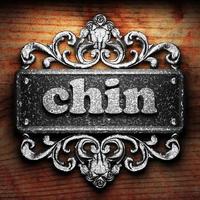 chin word of iron on wooden background photo