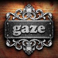 gaze word of iron on wooden background photo