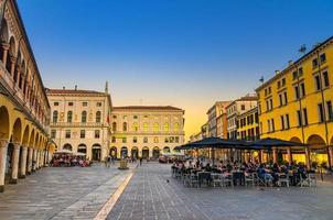 Padua, Italy, September 12, 2019 restaurant tables in Piazza delle Erbe square in historical city centre of Padova photo