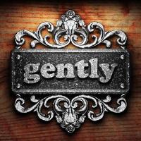 gently word of iron on wooden background photo