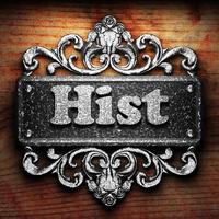 Hist word of iron on wooden background photo