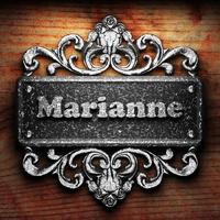 Marianne word of iron on wooden background photo