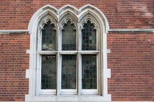 Beautiful window in gothic style. Three arches. London city photo