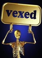 vexed word and golden skeleton photo