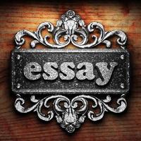 essay word of iron on wooden background photo