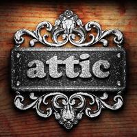 attic word of iron on wooden background photo
