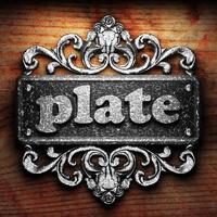 plate word of iron on wooden background photo