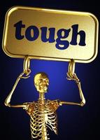 tough word and golden skeleton photo