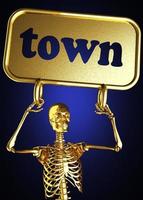 palabra de la ciudad y esqueleto dorado foto