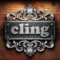 cling word of iron on wooden background photo