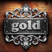 gold word of iron on wooden background photo