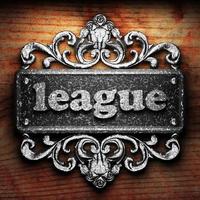 league word of iron on wooden background photo