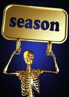 palabra de temporada y esqueleto dorado foto