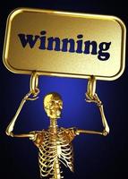 winning word and golden skeleton photo