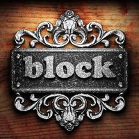 block word of iron on wooden background photo